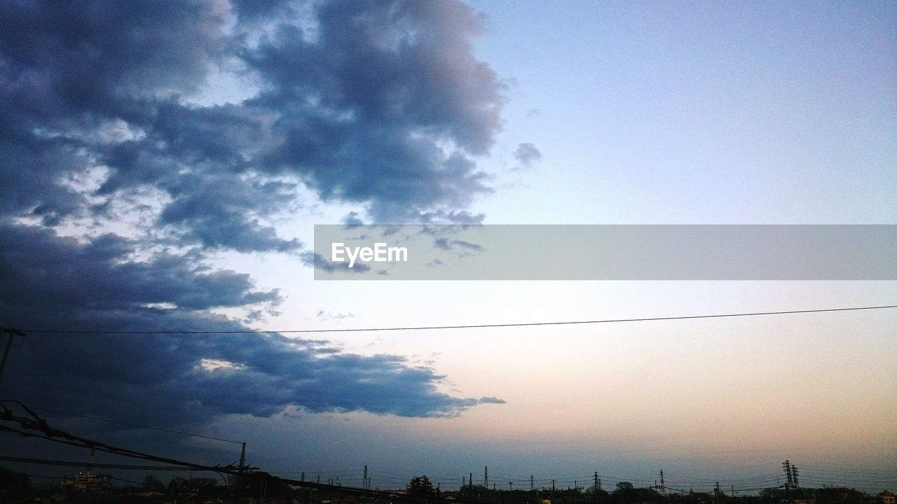 LOW ANGLE VIEW OF SILHOUETTE TREES AT DUSK