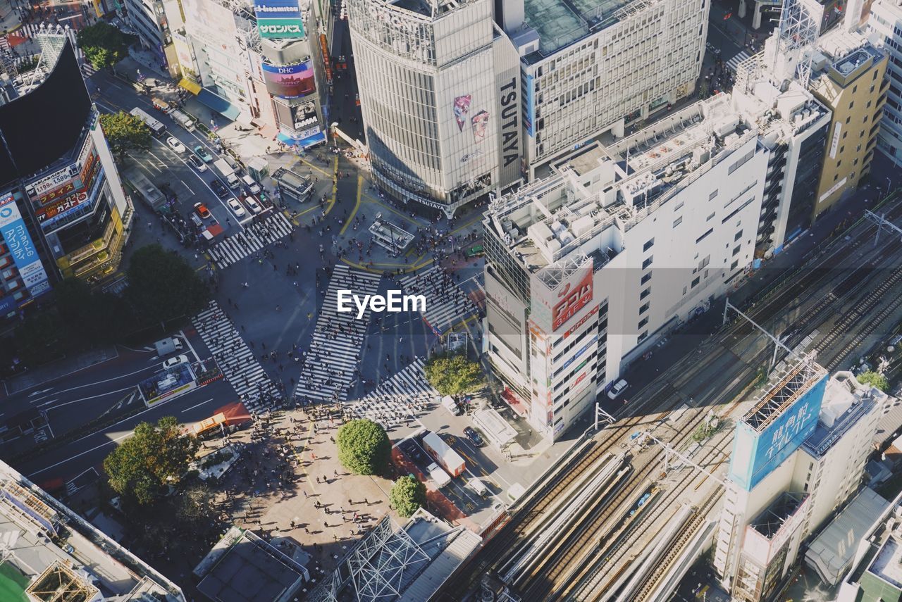High angle view of shibuya street amidst buildings in city