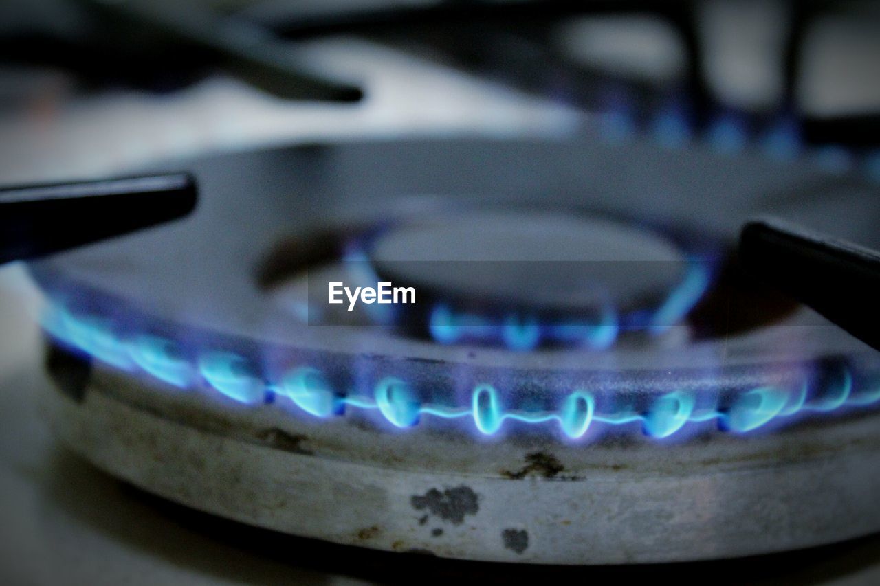 Close-up of flames in gas stove burner