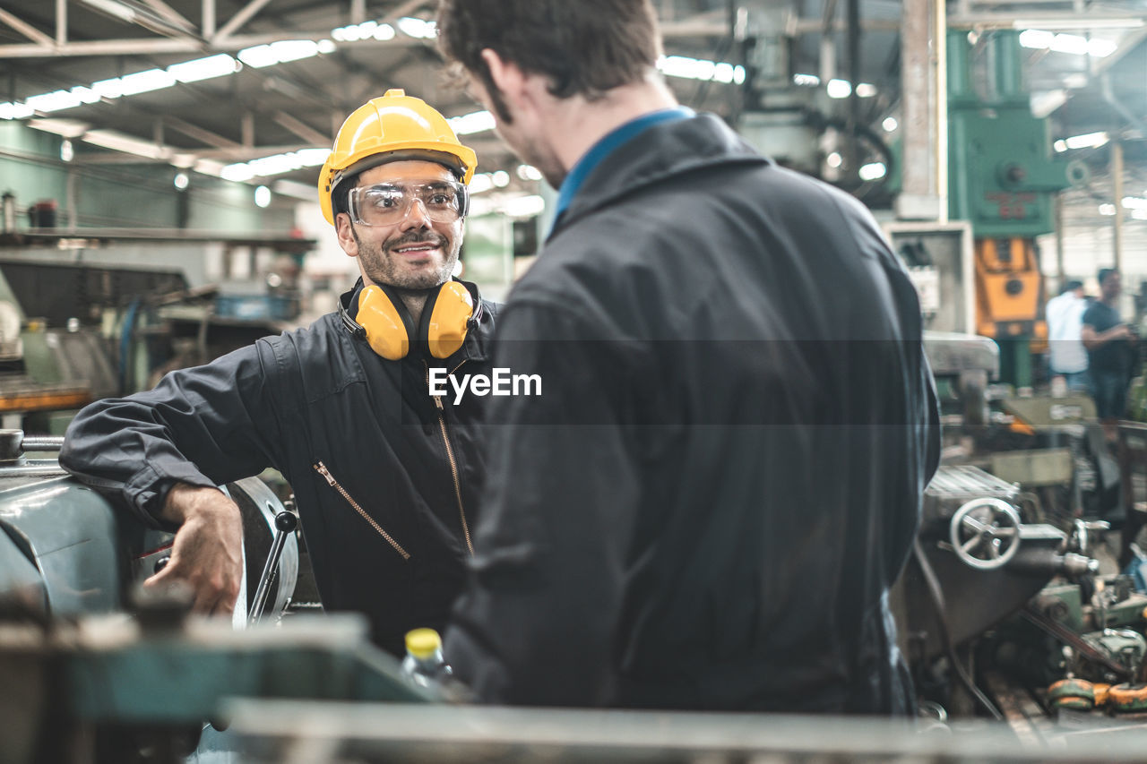 MAN WORKING IN INDUSTRY