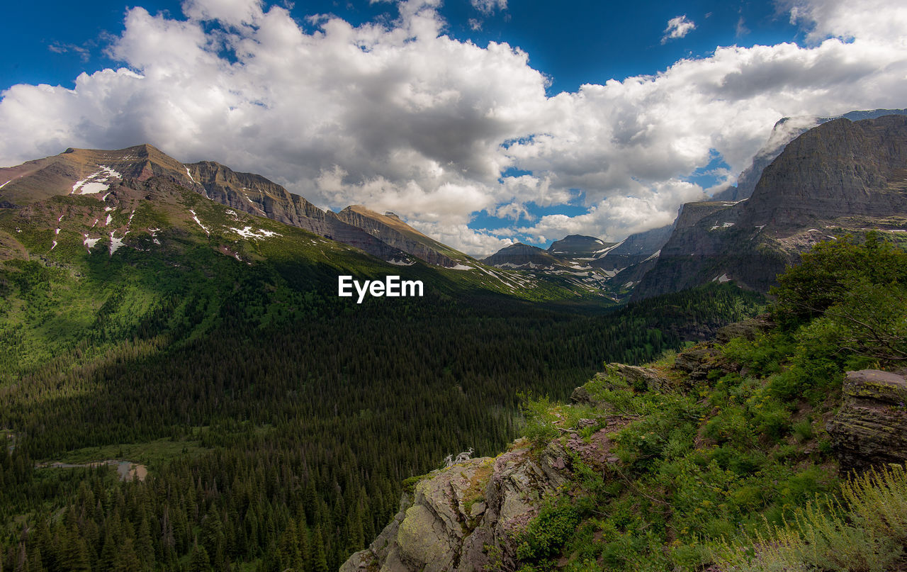 PANORAMIC VIEW OF LANDSCAPE AND MOUNTAINS AGAINST SKY