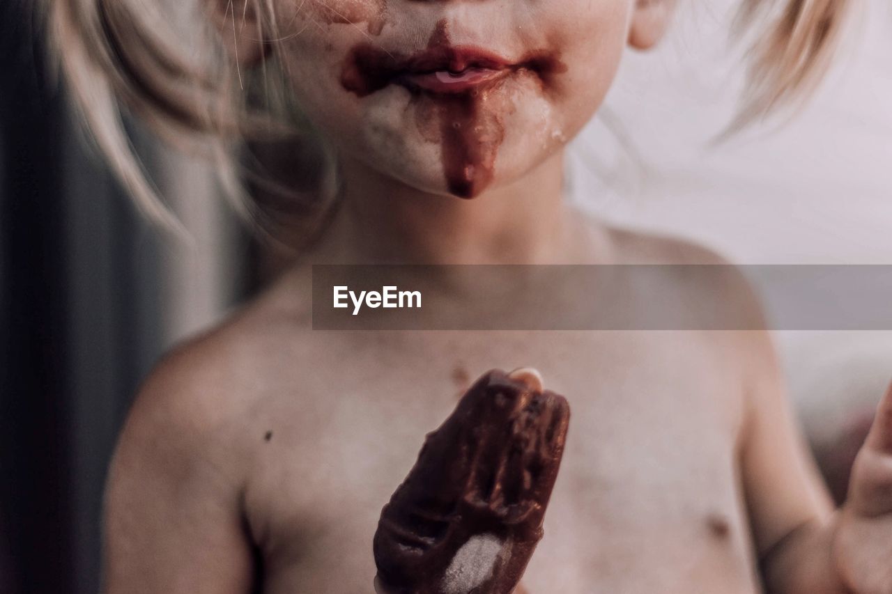 Close-up of girl eating ice cream