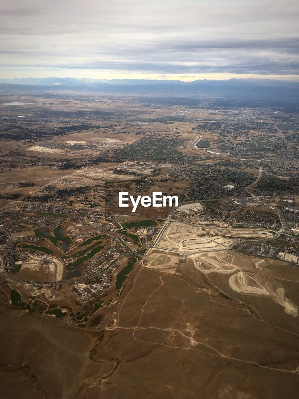 Aerial view of dramatic landscape against sky