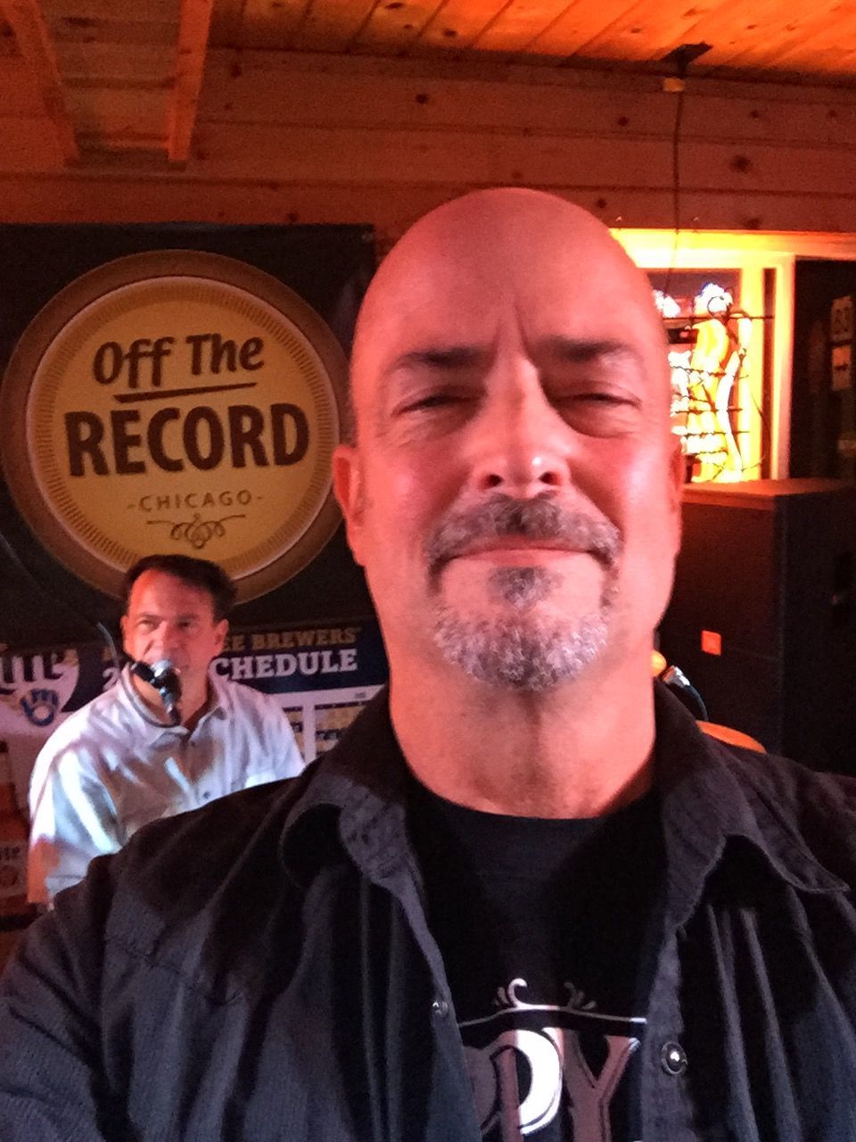 PORTRAIT OF SMILING YOUNG MAN