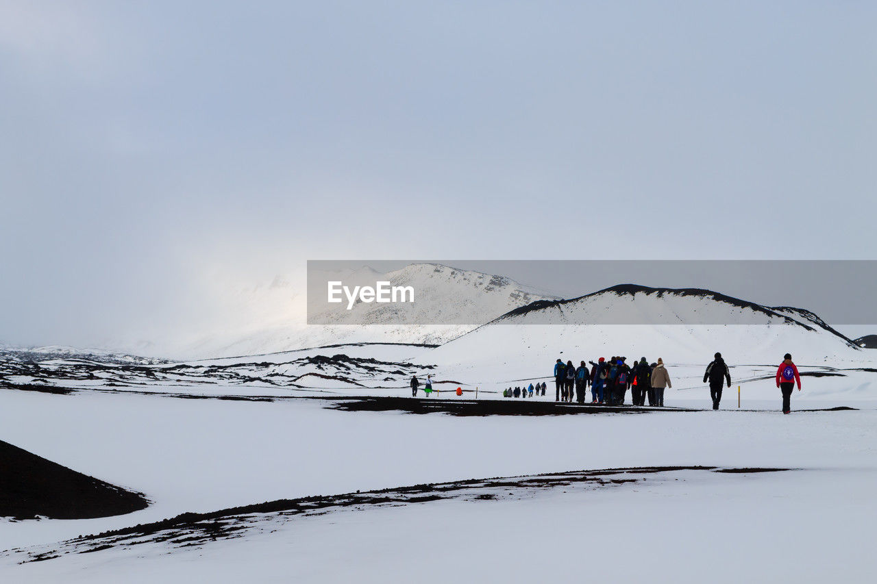 people skiing on snowcapped mountain