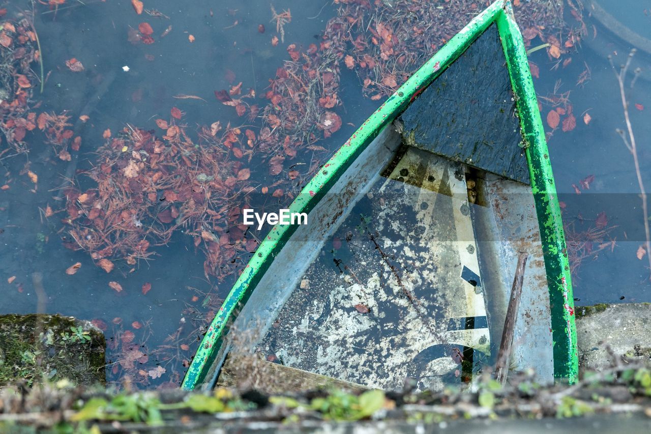 CLOSE-UP OF DAMAGED METAL STRUCTURE