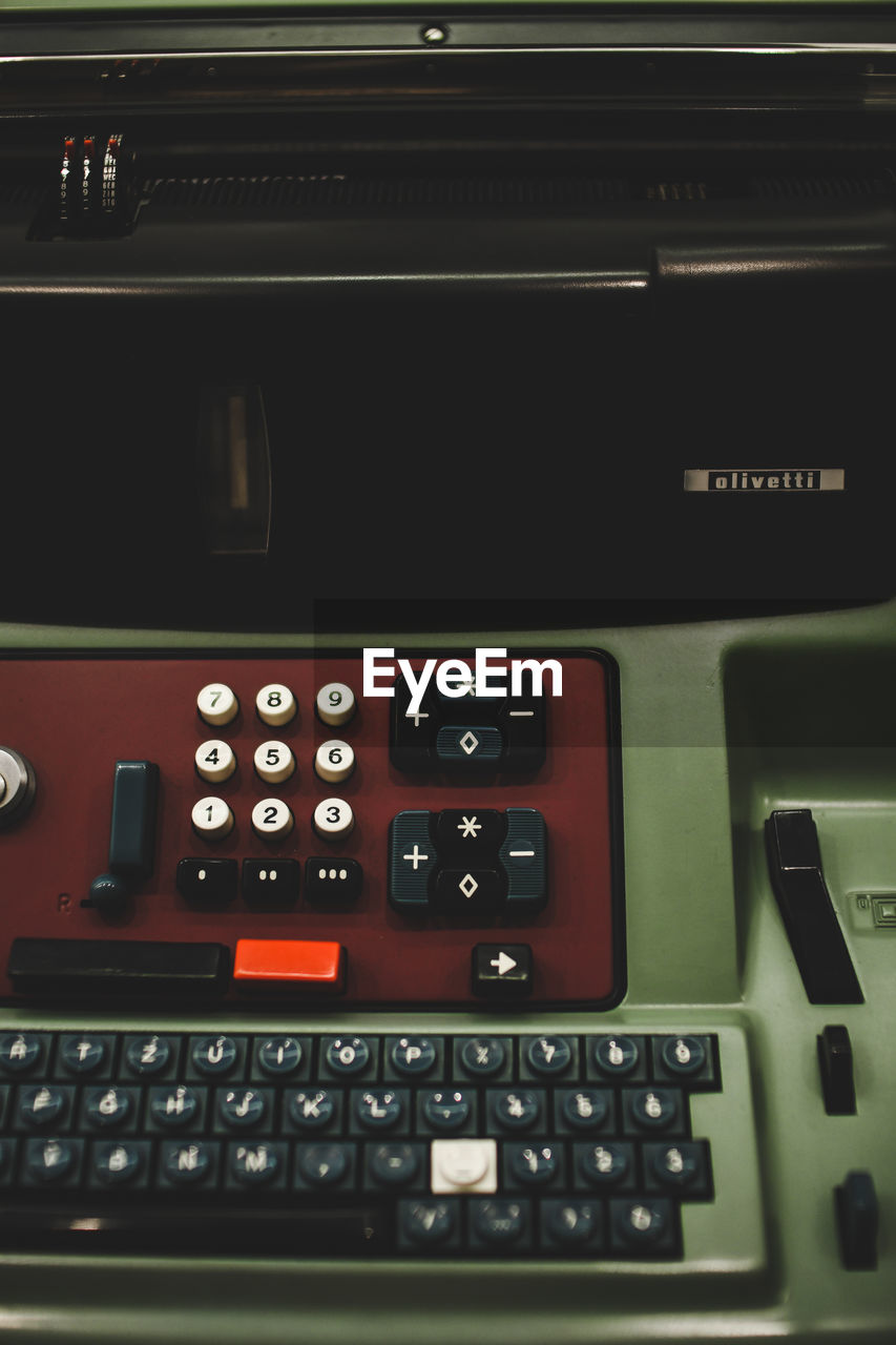 CLOSE-UP OF ILLUMINATED RED KEYBOARD