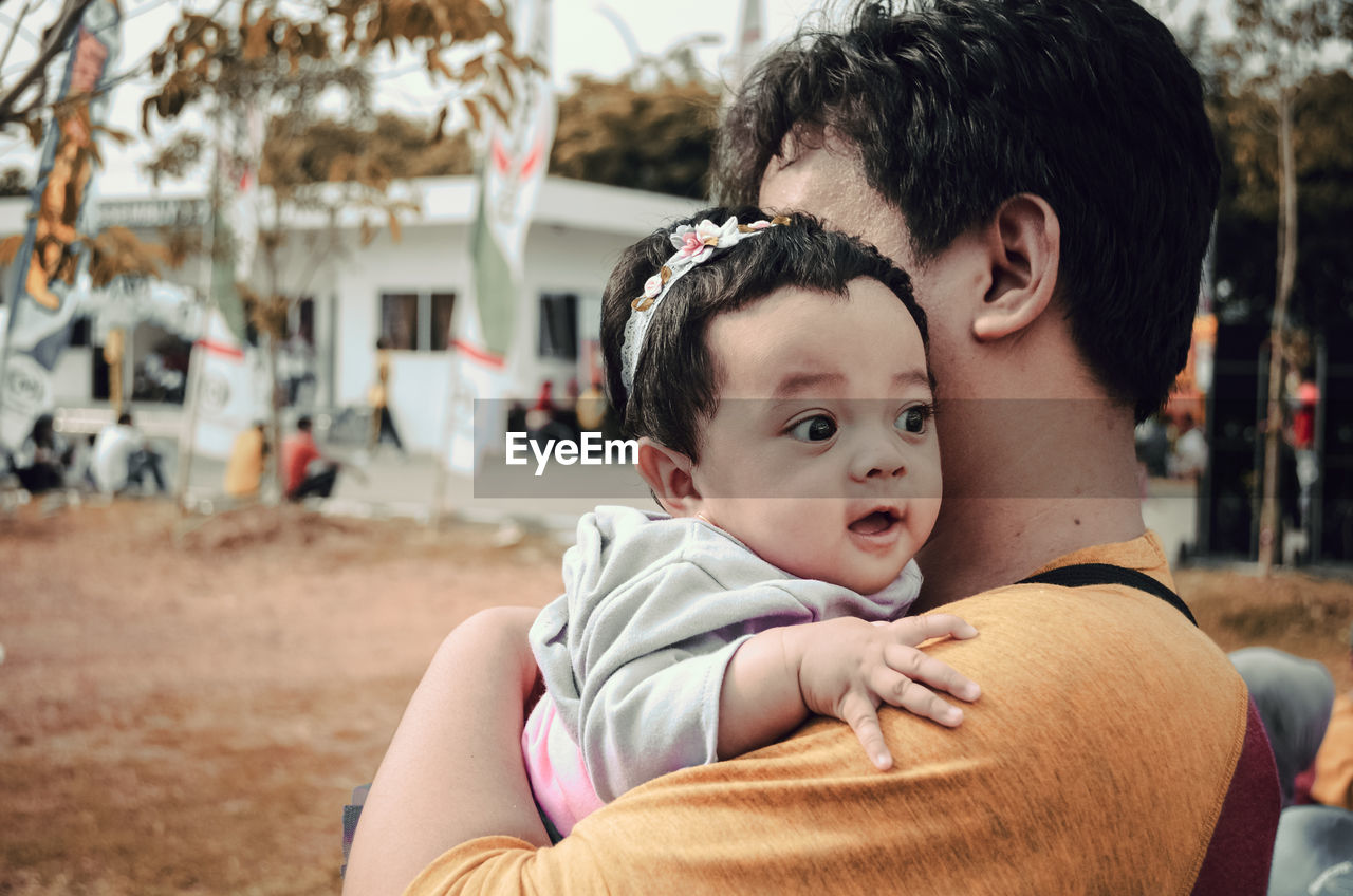 Portrait of father and daughter