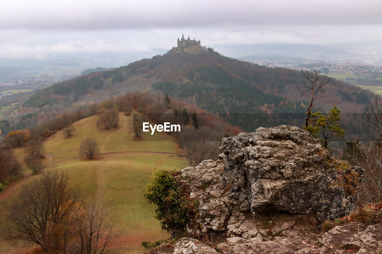 SCENIC VIEW OF MOUNTAIN AGAINST SKY