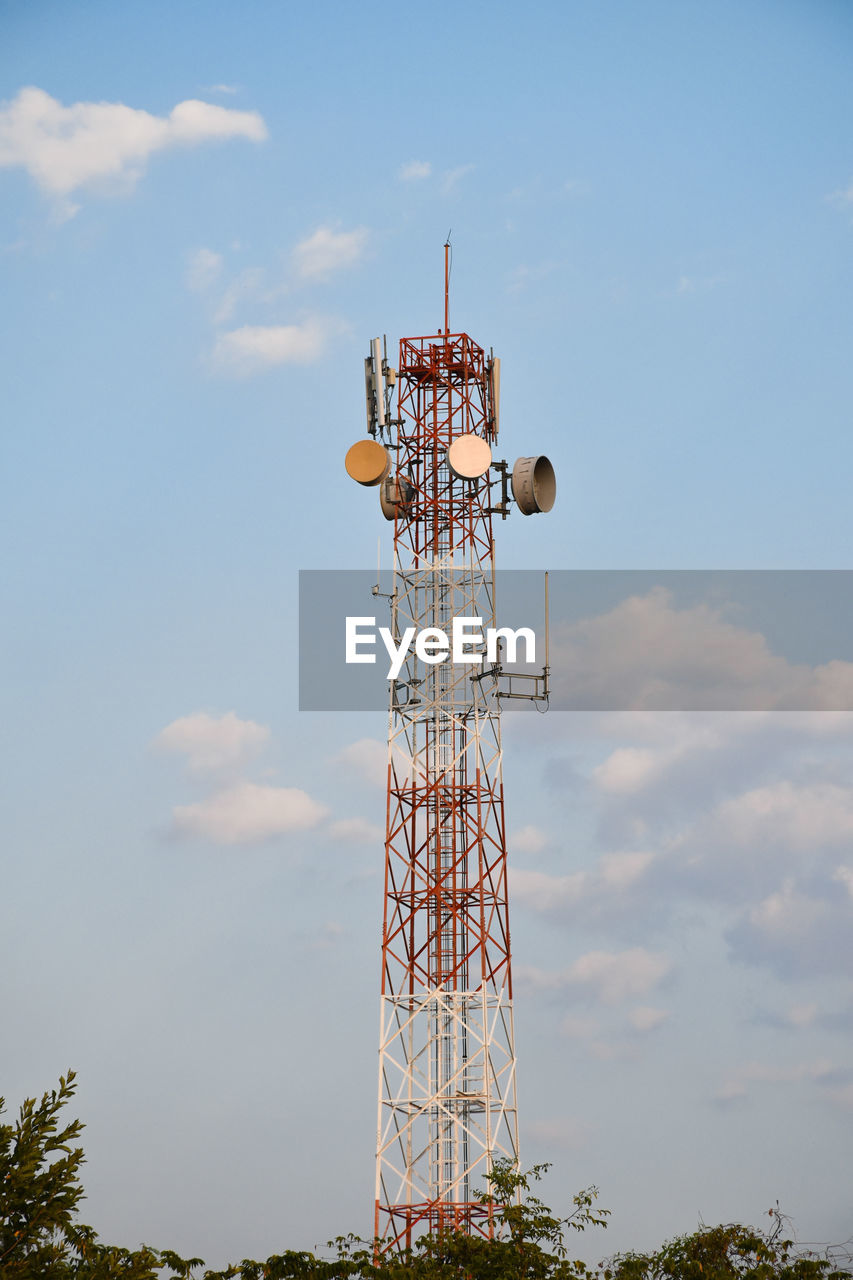 Low angle view of electricity pylon against sky