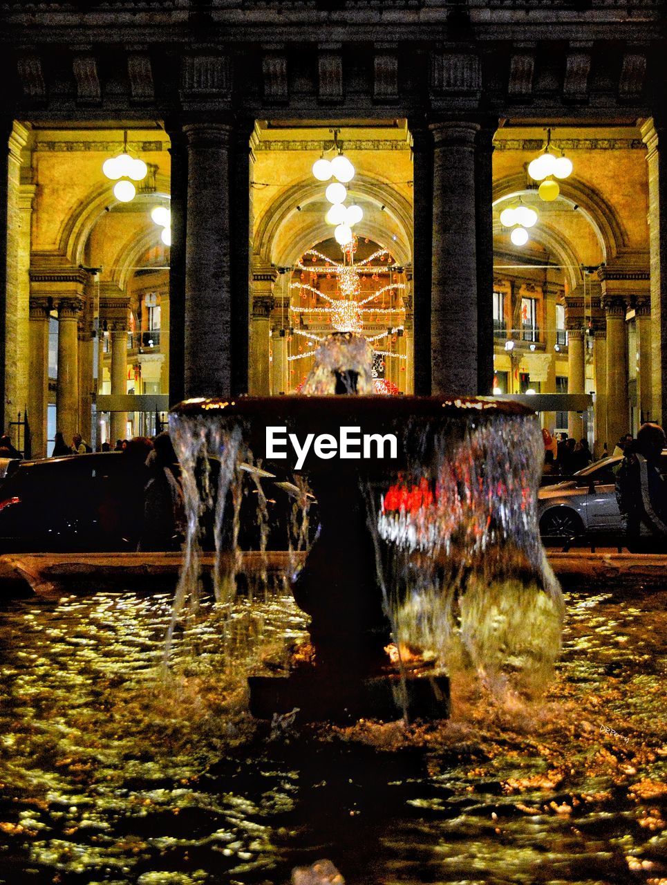 WATER FOUNTAIN IN ILLUMINATED BUILDING