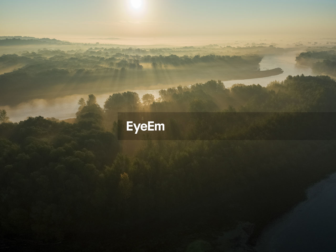Aerial view of morning sunrise on the drava river