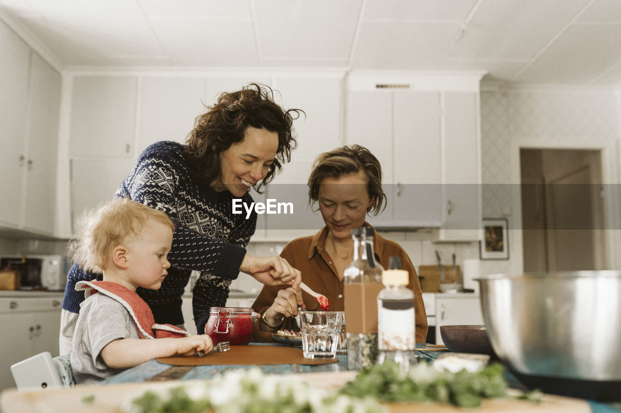 Family eating lunch together at home