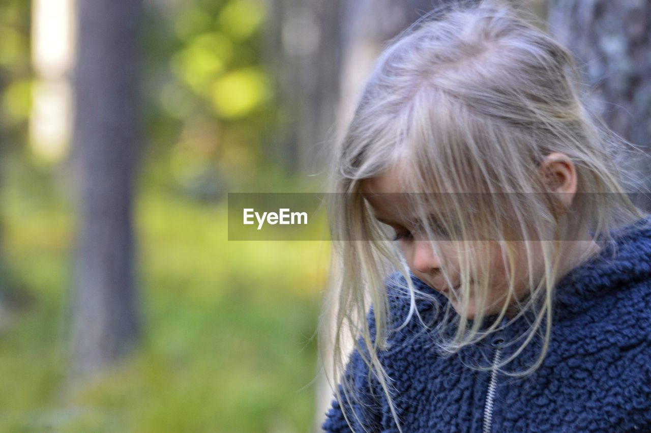 Close-up of girl in forest
