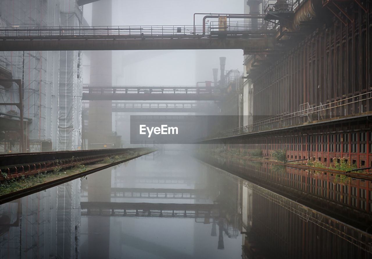 Industrial landscape in the morning fog