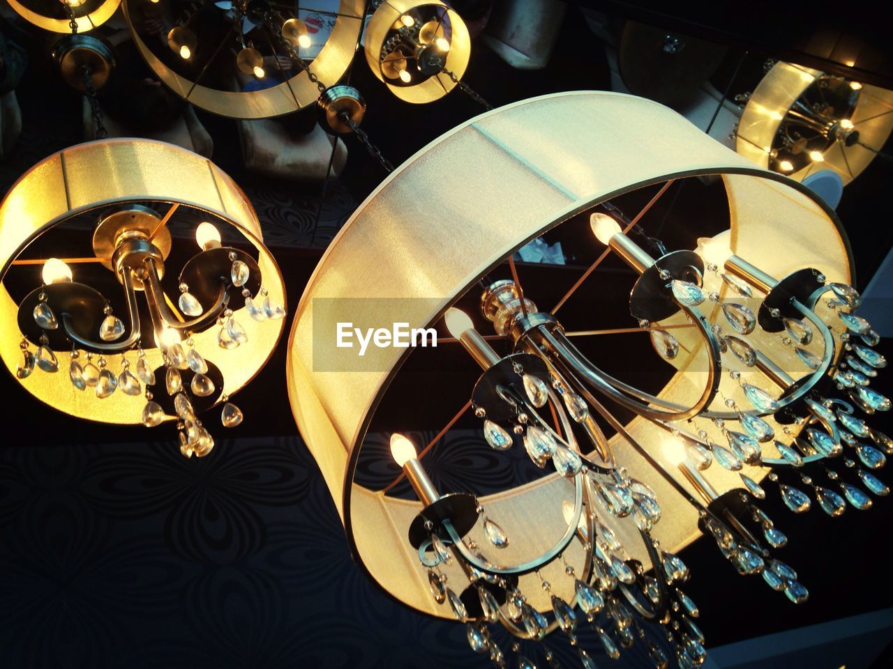 Low angle view of illuminated chandelier