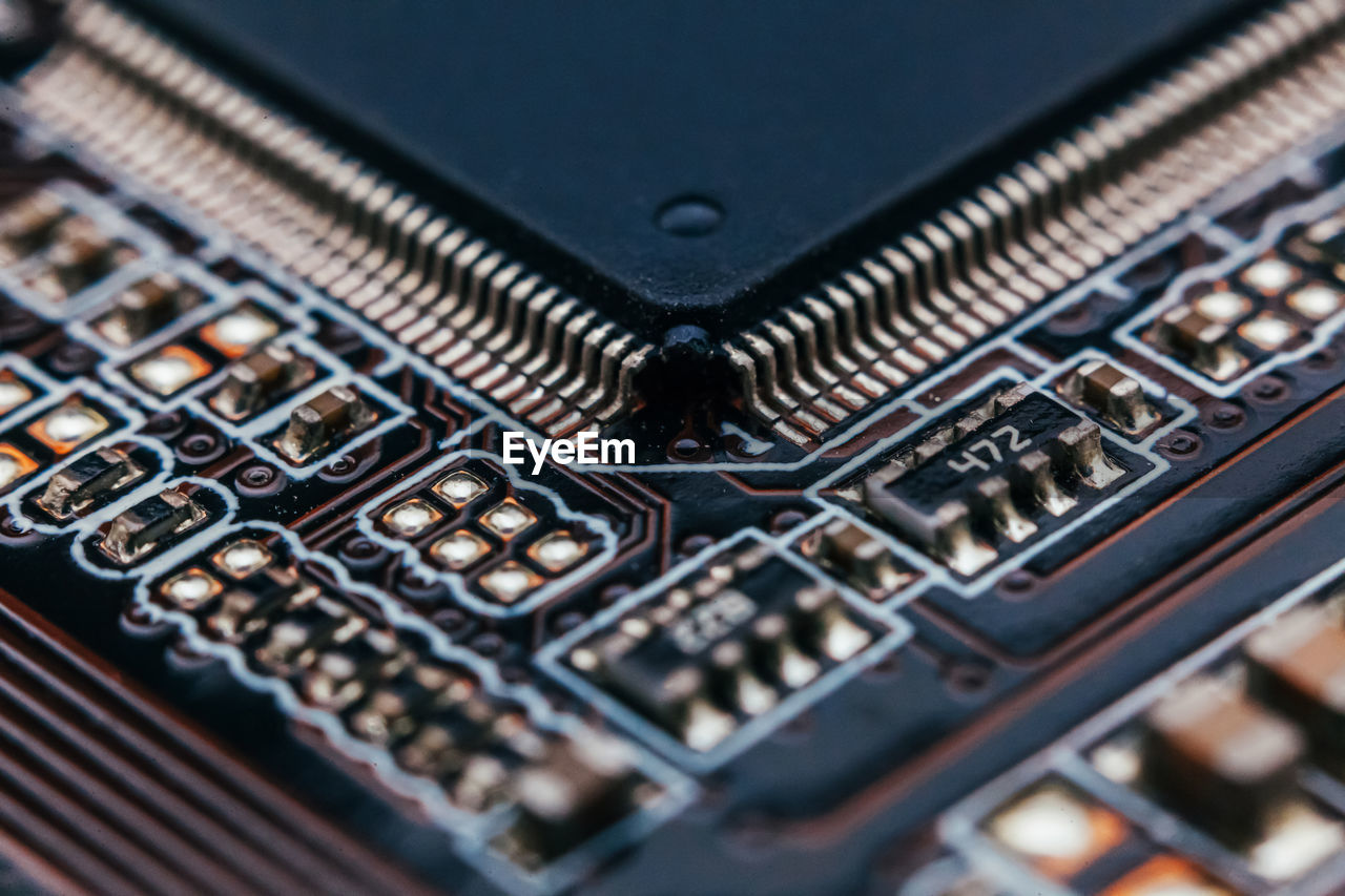 technology, computer chip, circuit board, close-up, electronics industry, computer part, computer equipment, computer, motherboard, no people, complexity, personal computer hardware, industry, indoors, equipment, selective focus, metal, full frame