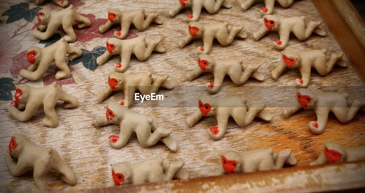 HIGH ANGLE VIEW OF SHEEP AND COOKIES IN KITCHEN