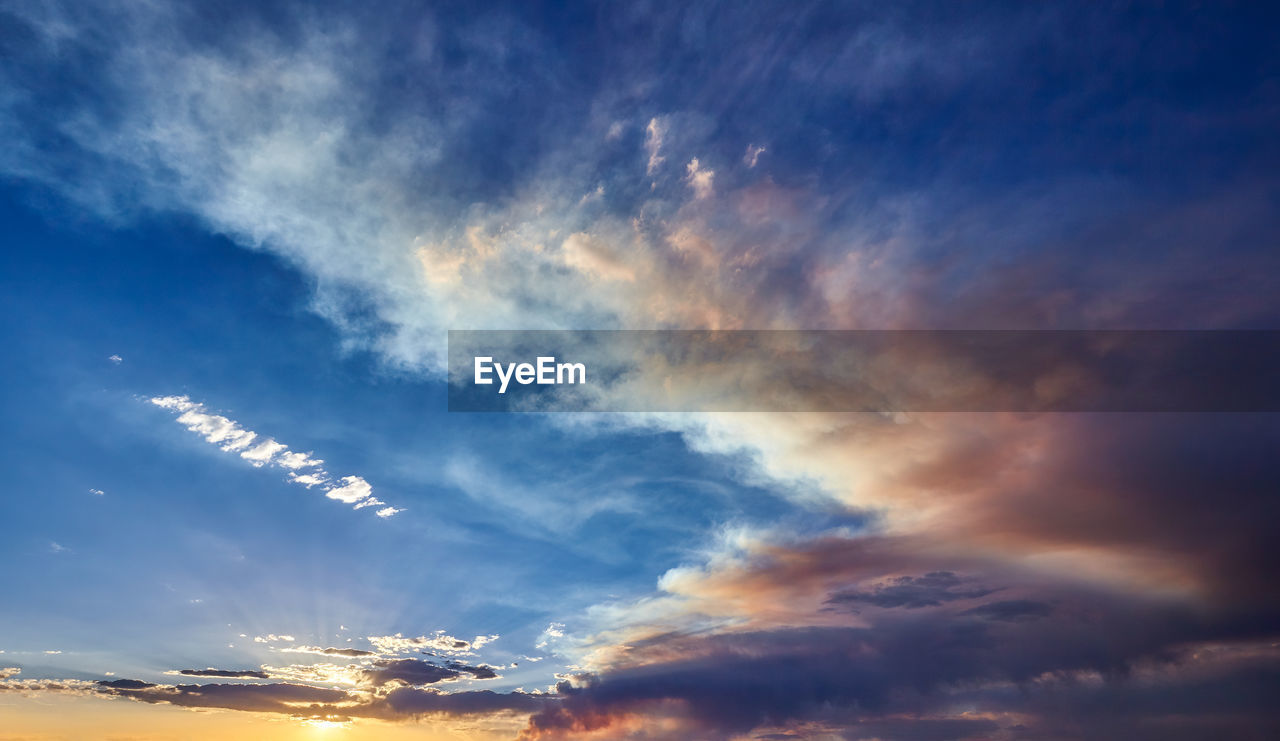 LOW ANGLE VIEW OF CLOUDY SKY DURING SUNSET