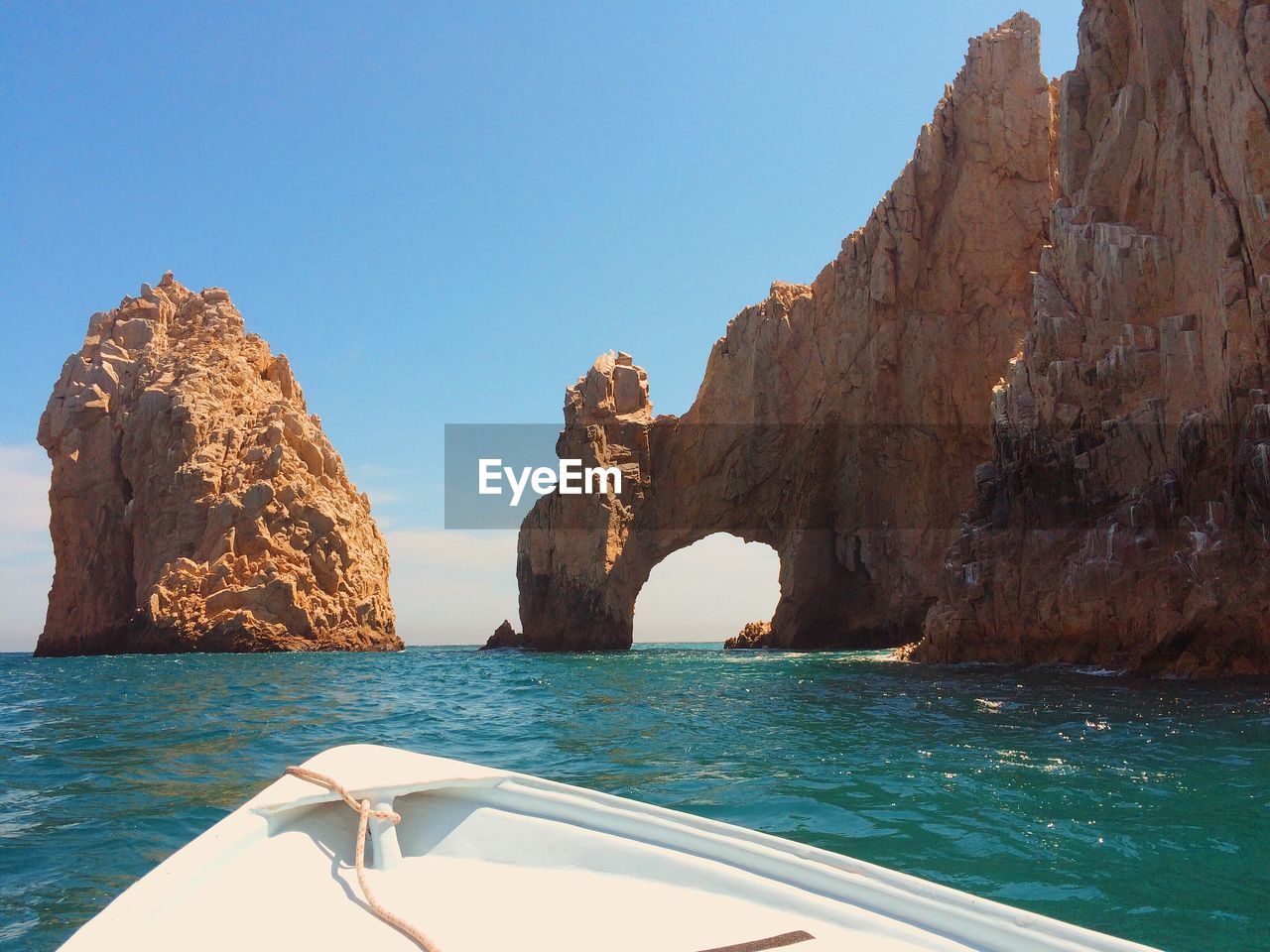 Panoramic view of sea against clear blue sky