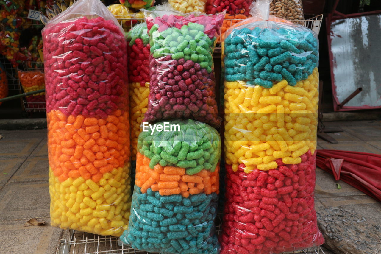 Close-up of multi colored candies for sale in market