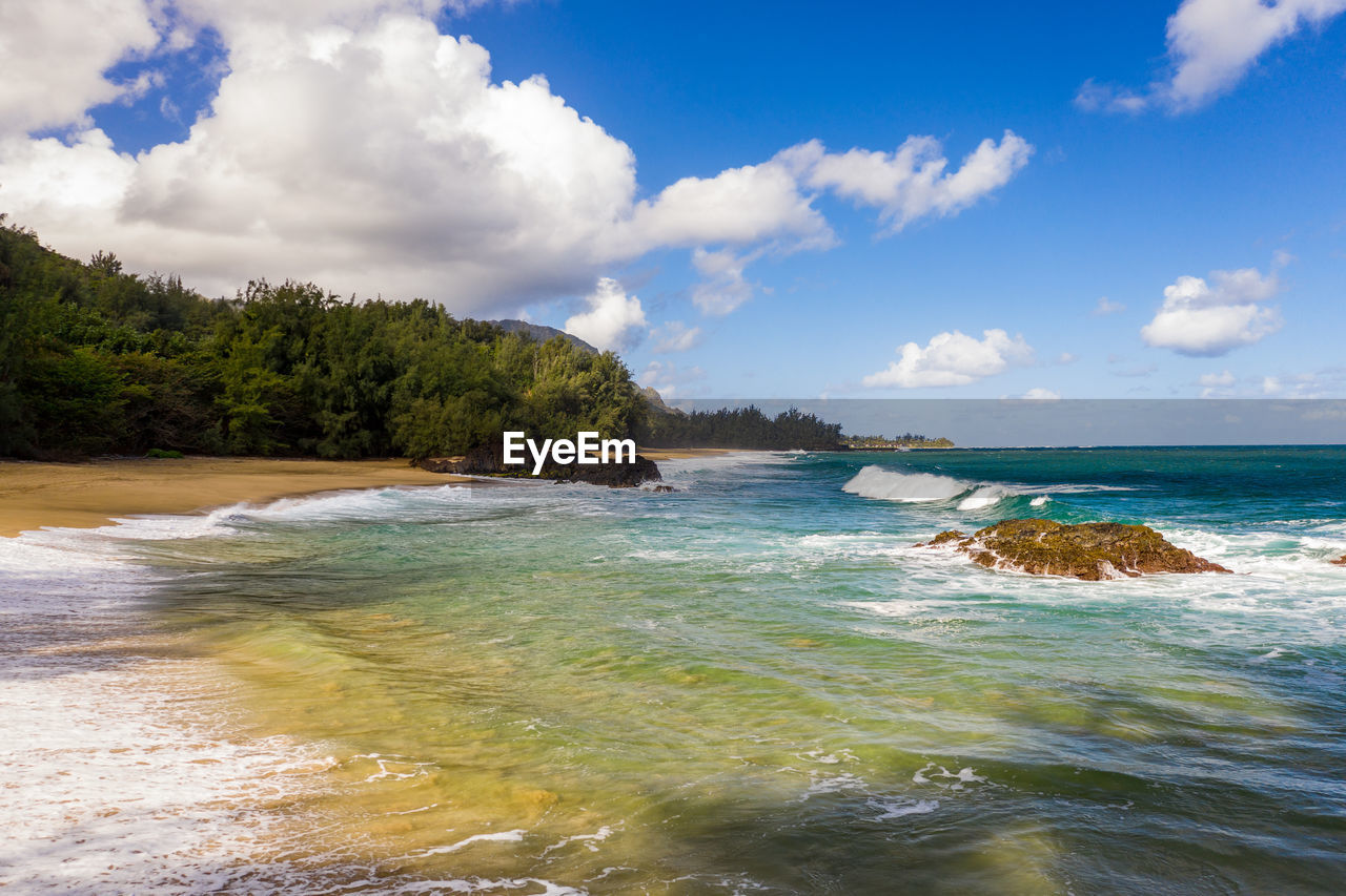 Aerial panoramic image off the coast over lumaha'i beach on hawaiian island of kauai with na pali 