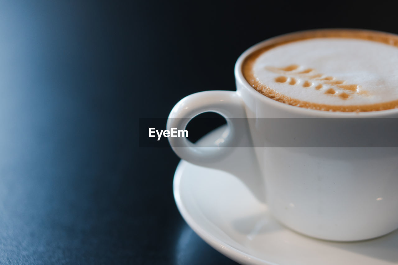 Close-up of coffee on table