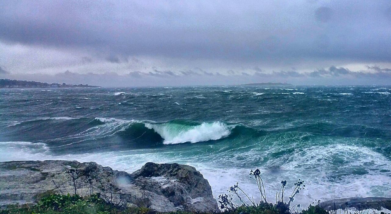 VIEW OF SEA AGAINST CLOUDY SKY