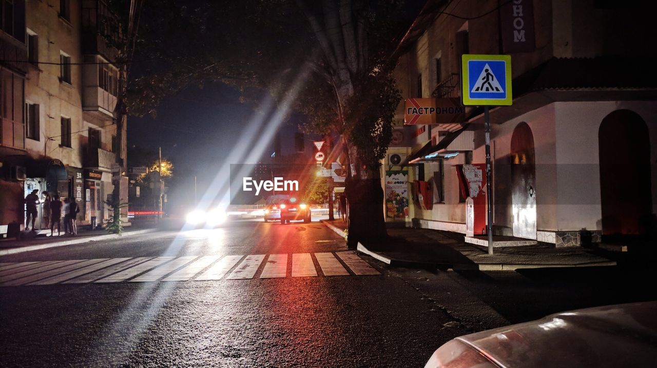 CITY STREET AT NIGHT