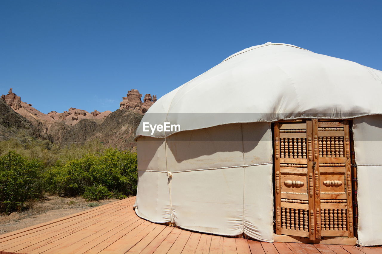 BUILT STRUCTURE AGAINST CLEAR BLUE SKY