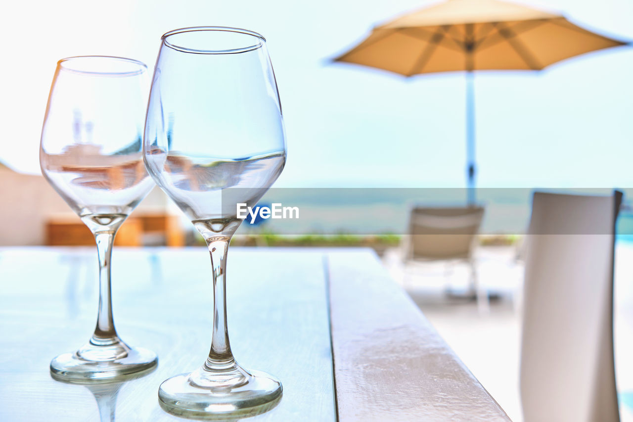 Luxury terrace balcony for relaxed vacation at wine glasses, selective focus. travel luxury concept