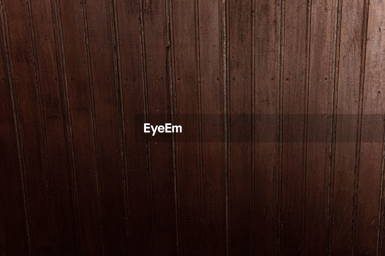 wood, backgrounds, textured, wood grain, pattern, brown, flooring, hardwood, timber, plank, full frame, material, no people, wood paneling, dark, copy space, wall - building feature, striped, wood flooring, abstract, wood stain, close-up, surface level, hardwood floor, laminate flooring, floor, rough, tree, indoors, brown background, old, textured effect, built structure, architecture, industry, surrounding wall, home interior, nature, design element, construction industry, in a row, carpentry, lumber industry, colored background, macro, wall, knotted wood, smooth, arts culture and entertainment, extreme close-up