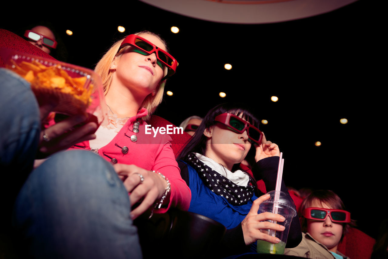 People sitting in movie theater