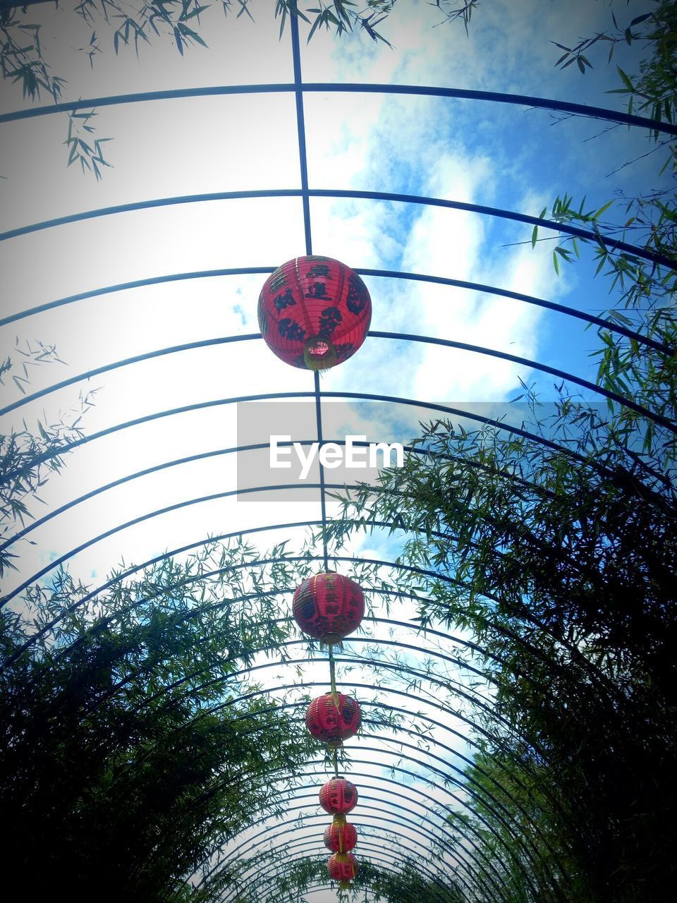 LOW ANGLE VIEW OF LANTERN HANGING AGAINST CLEAR SKY