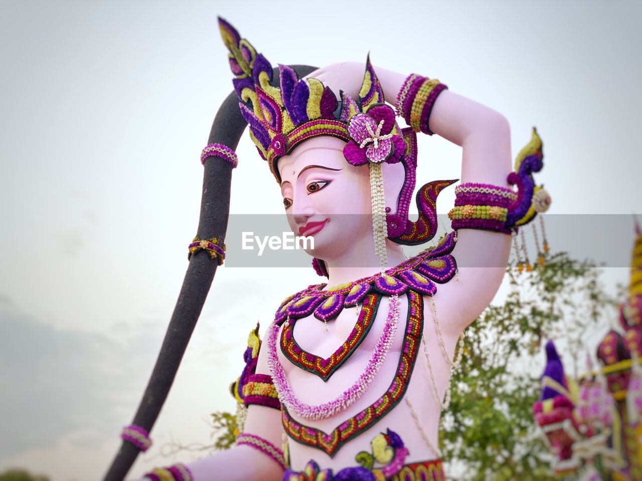 Low angle view of statue against sky
