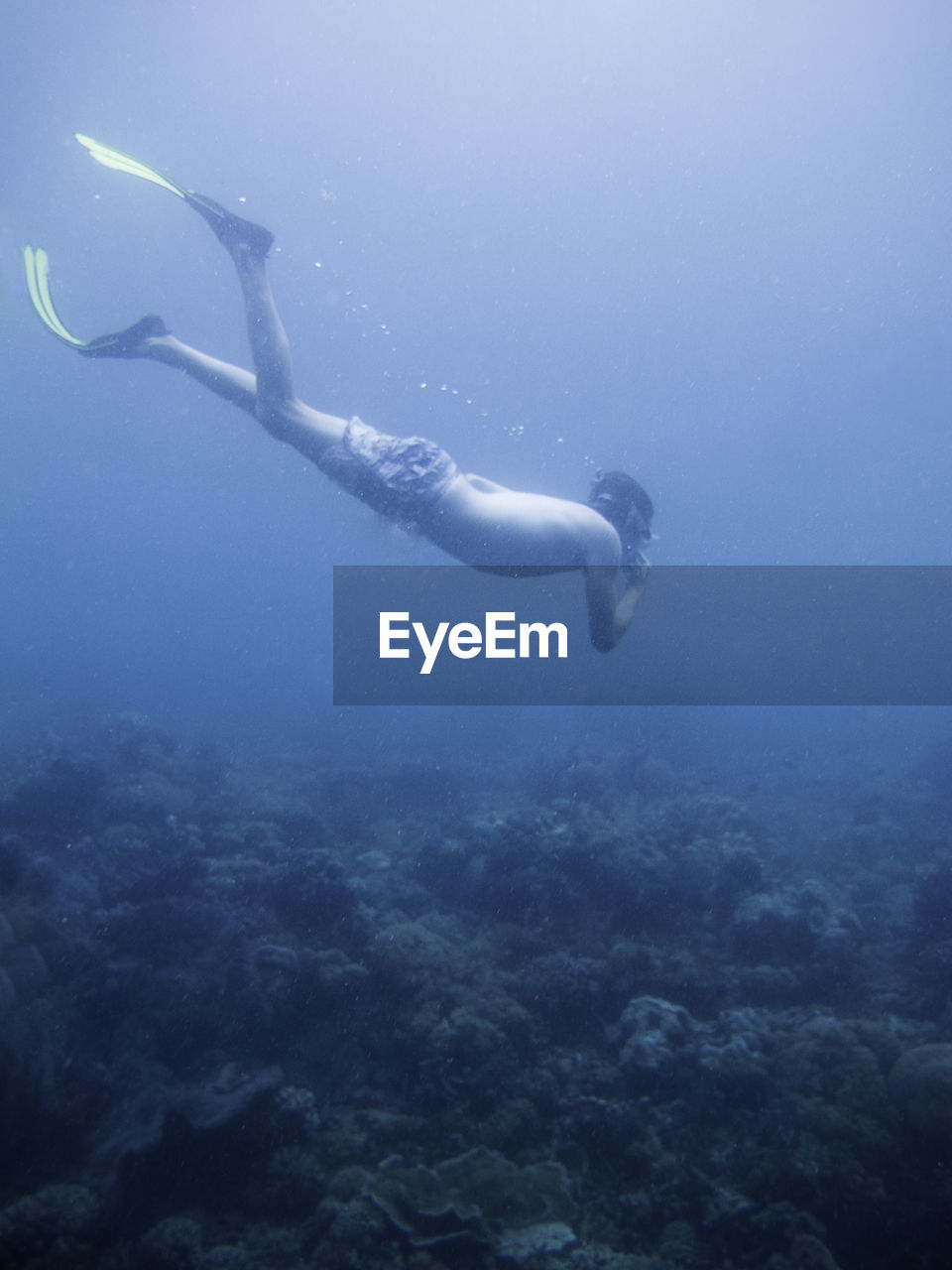 Man swimming in sea