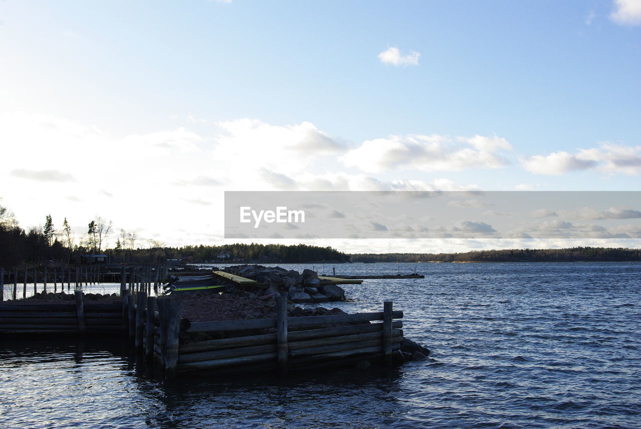 View of calm lake against the sky