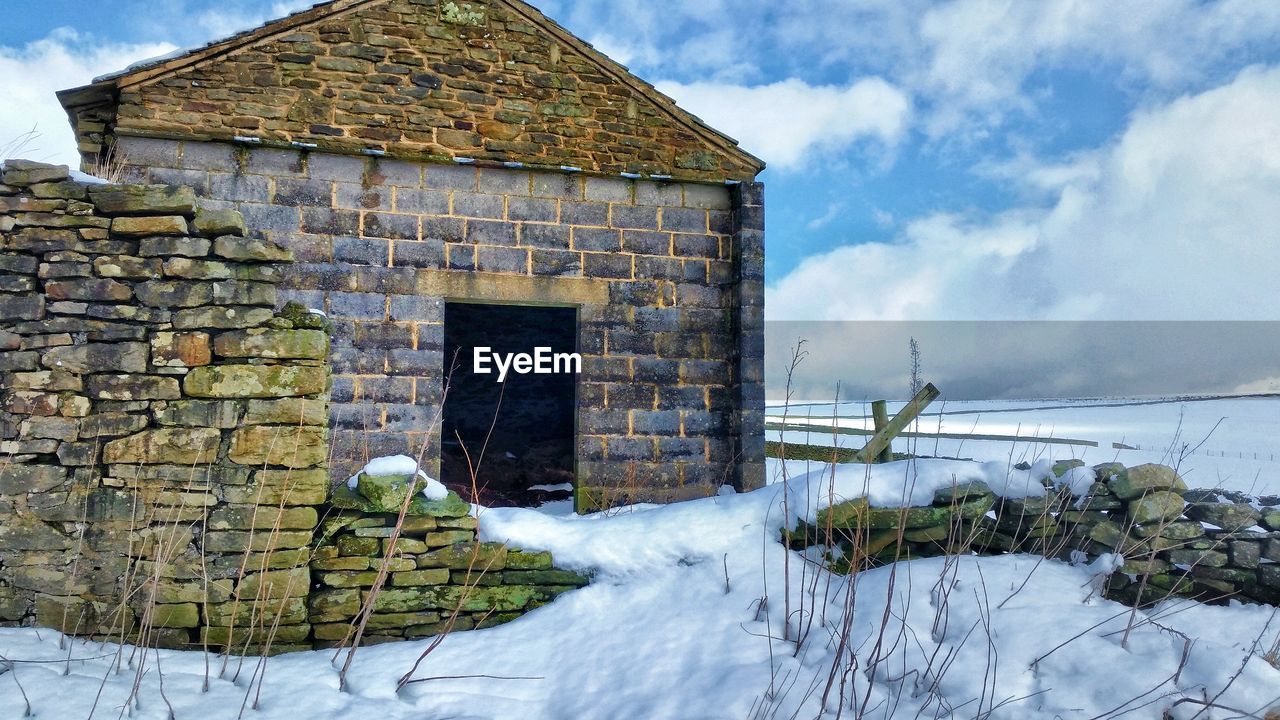 House against blue sky during winter