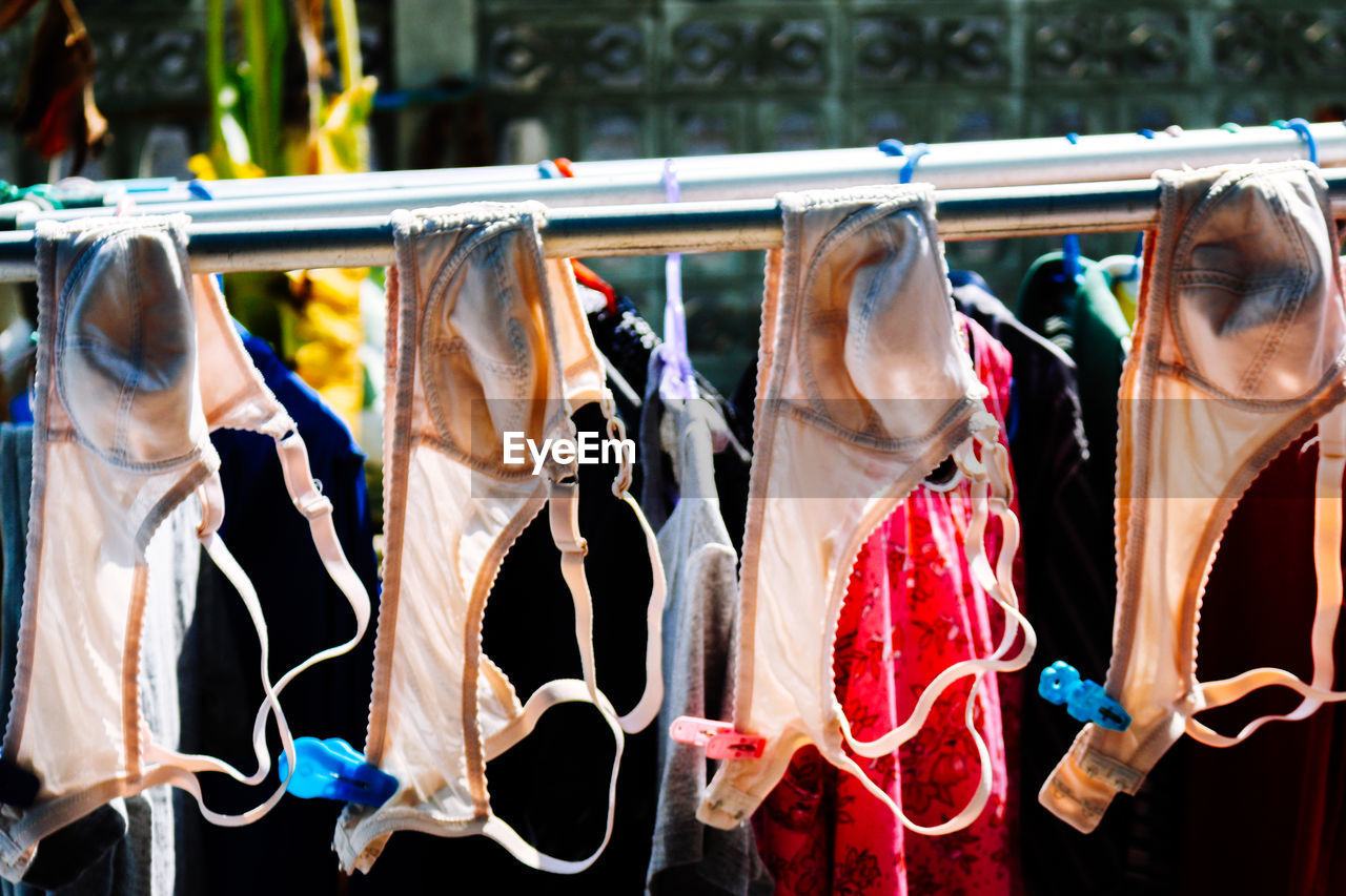 Clothes drying on rack