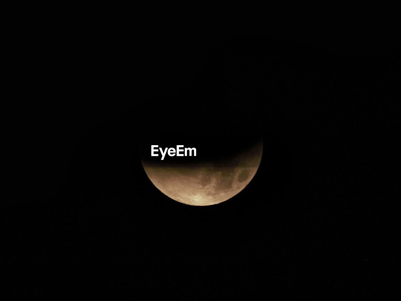 CLOSE-UP OF MOON IN THE DARK