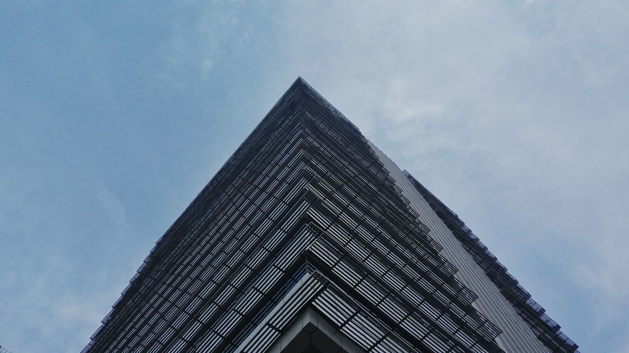 LOW ANGLE VIEW OF MODERN SKYSCRAPER