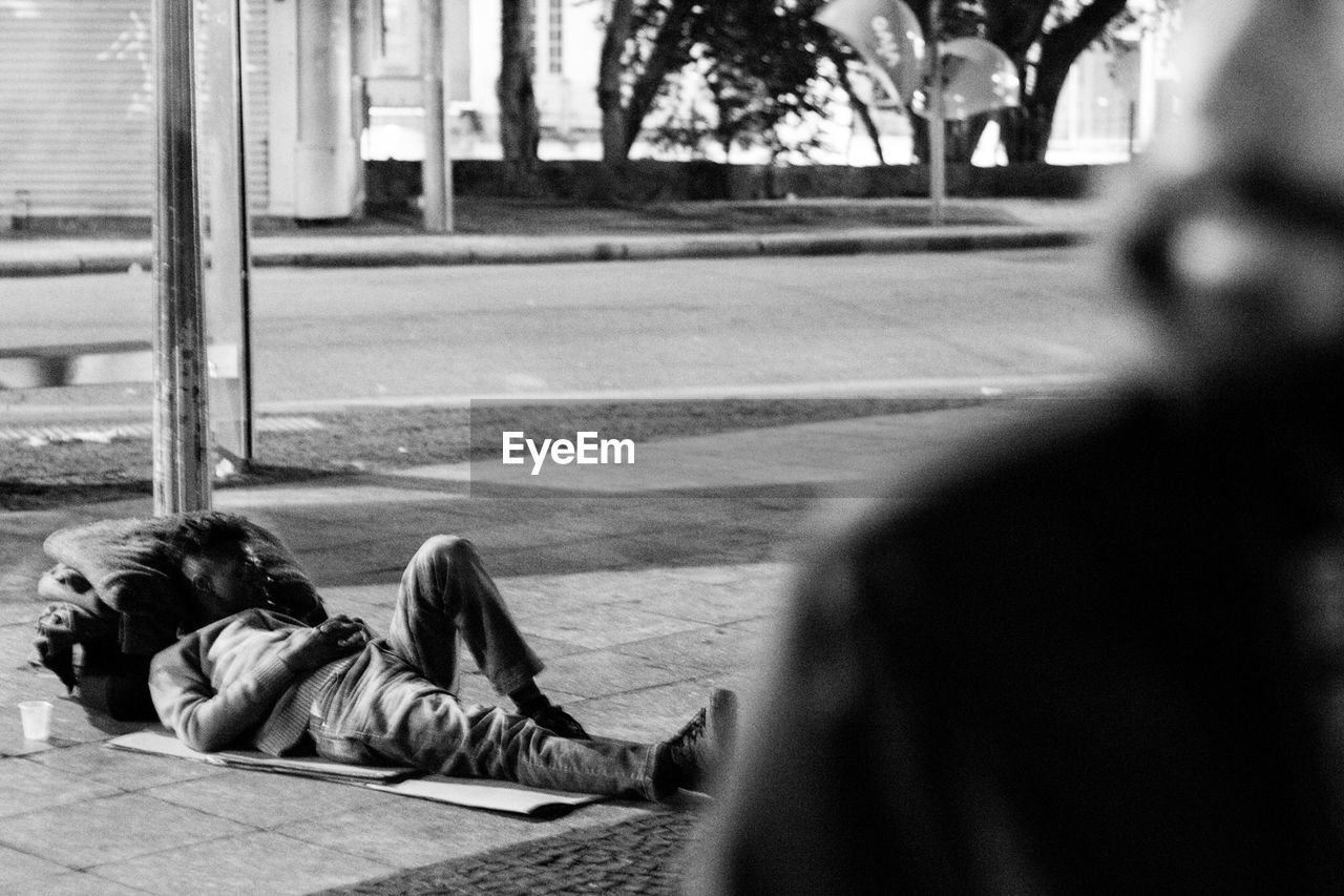 PEOPLE RELAXING ON STREET