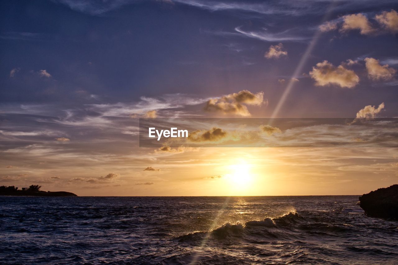 Scenic view of sea against sky during sunset