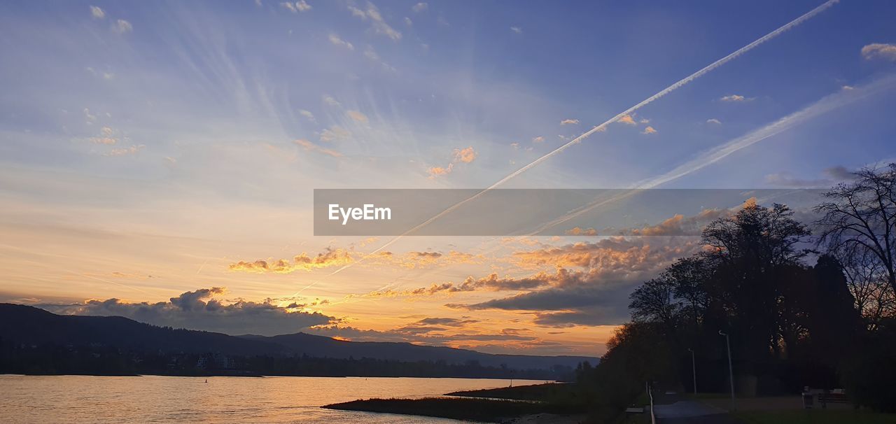 SCENIC VIEW OF SILHOUETTE TREE AGAINST SKY DURING SUNSET