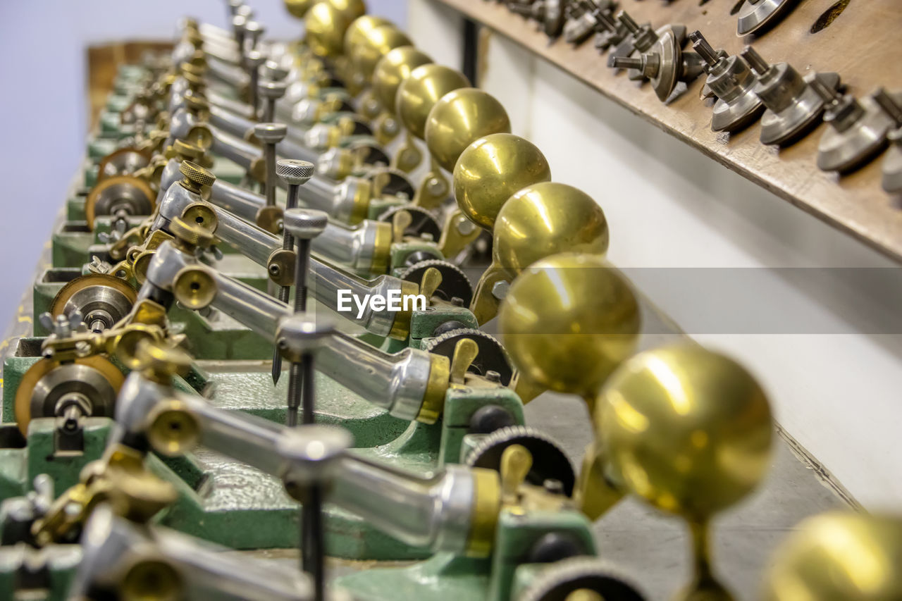 HIGH ANGLE VIEW OF EQUIPMENT ON METAL TABLE