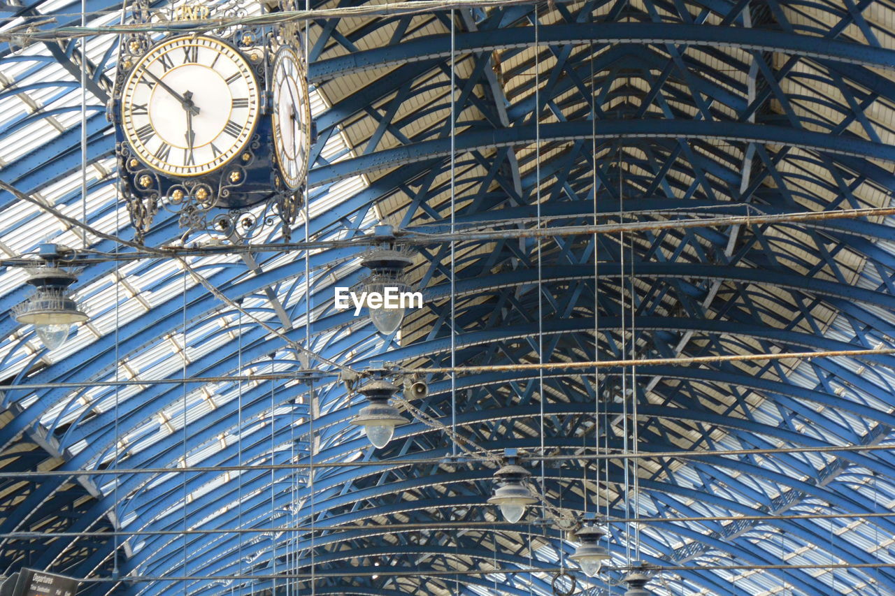 Low angle view of clock at brighton railway station