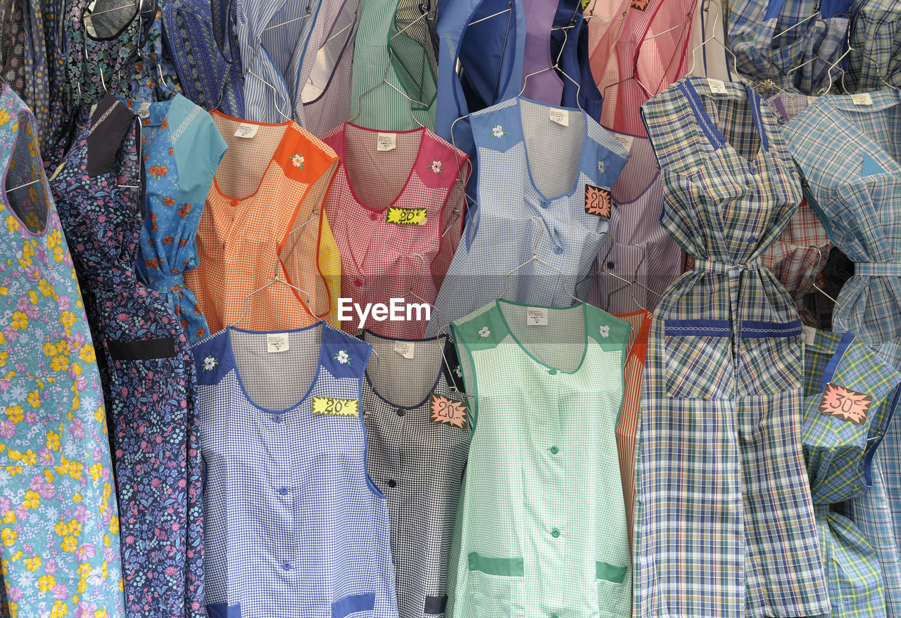 Colorful nightdresses at market stall