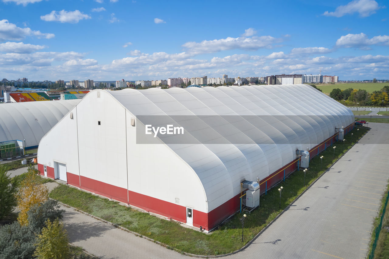 high angle view of built structures against sky