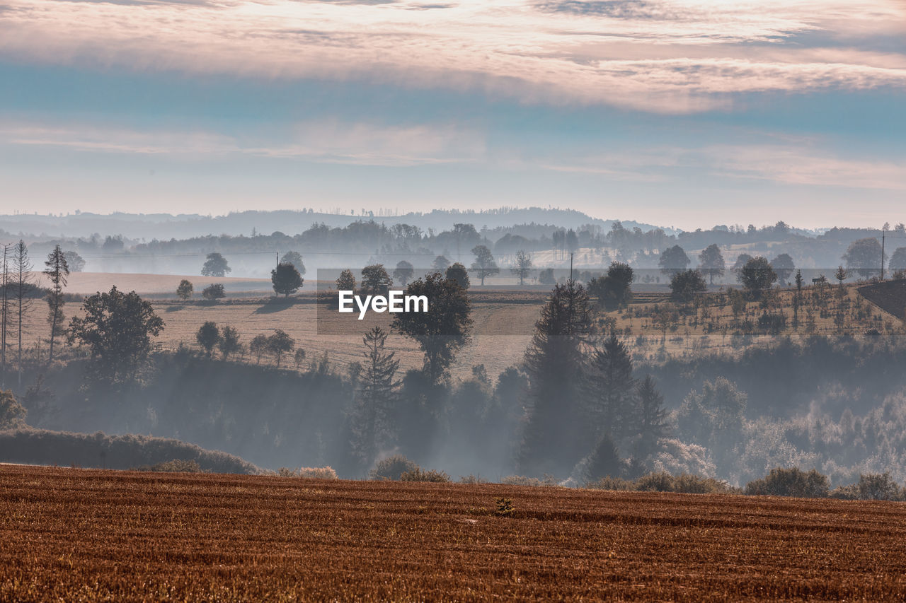 panoramic view of landscape against sky during sunset