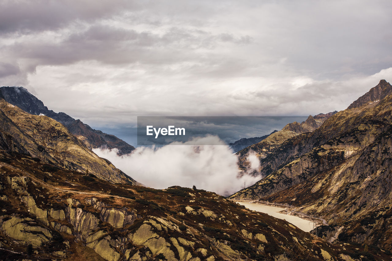 Morning mist in the mountains, swiss alps.